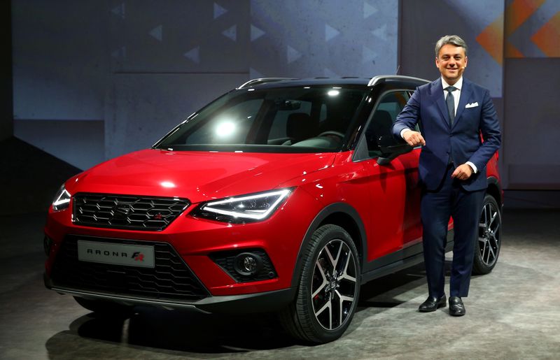 © Reuters. FILE PHOTO: SEAT President and CEO Luca de Meo poses with the new Seat Arona car during a launch event in Barcelona