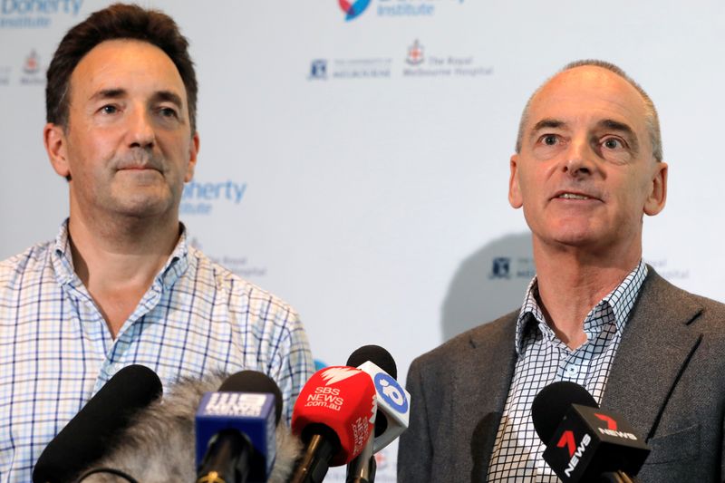 © Reuters. The Royal Melbourne Hospital's Dr Julian Druce, Virus Identification Laboratory Head at the Doherty Institute and Dr Mike Catton, Deputy Director of the Doherty Institute address media to announce having successfully grown the Wuhan coronavirus from 