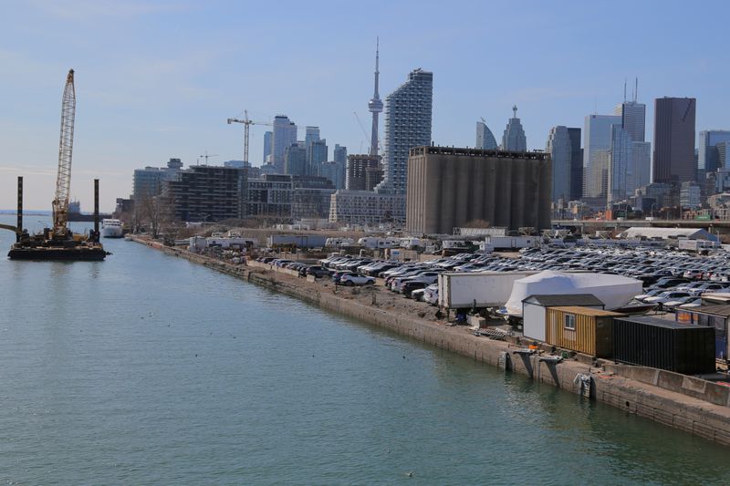 © Reuters. FILE PHOTO: The downtown skyline and CN Tower are seen past the eastern waterfront area of Toronto