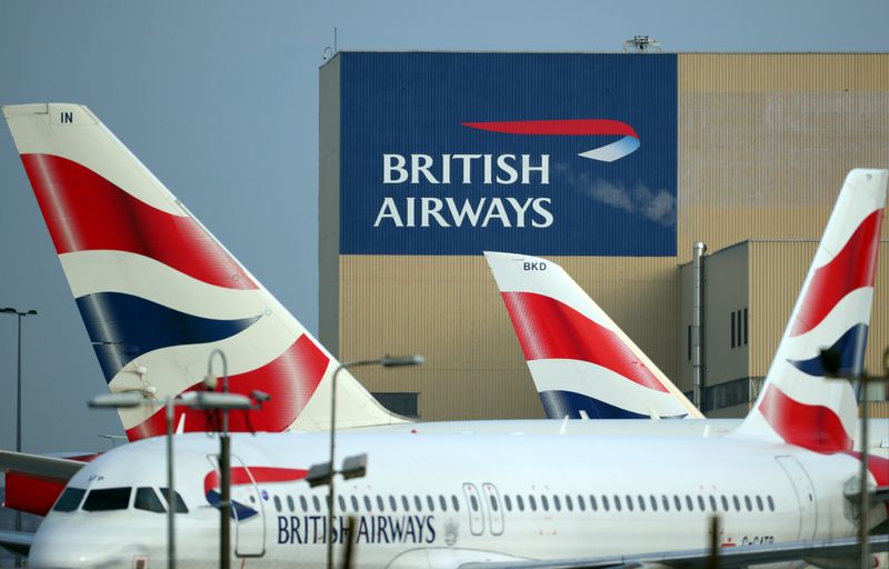 © Reuters. FILE PHOTO: British Airways aircraft are seen at Heathrow Airport in west London