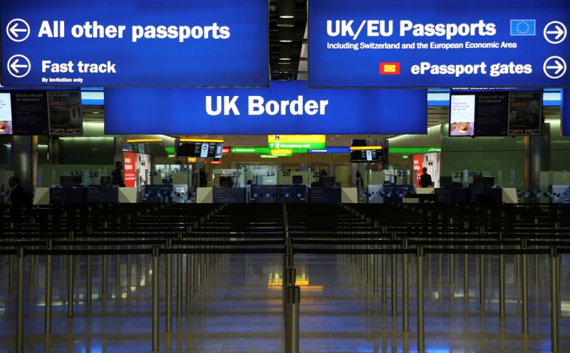 © Reuters. FILE PHOTO: UK Border control is seen in Terminal 2 at Heathrow Airport in London