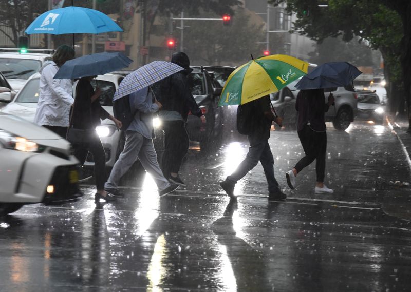 Australia welcomes drought-easing drenching, even as it brings floods