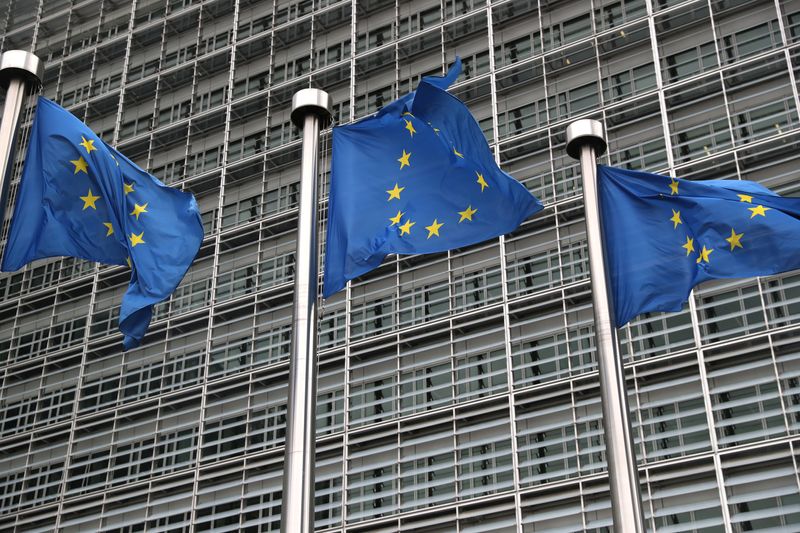 © Reuters. FILE PHOTO: European Union flags fly outside the European Commission headquarters in Brussels