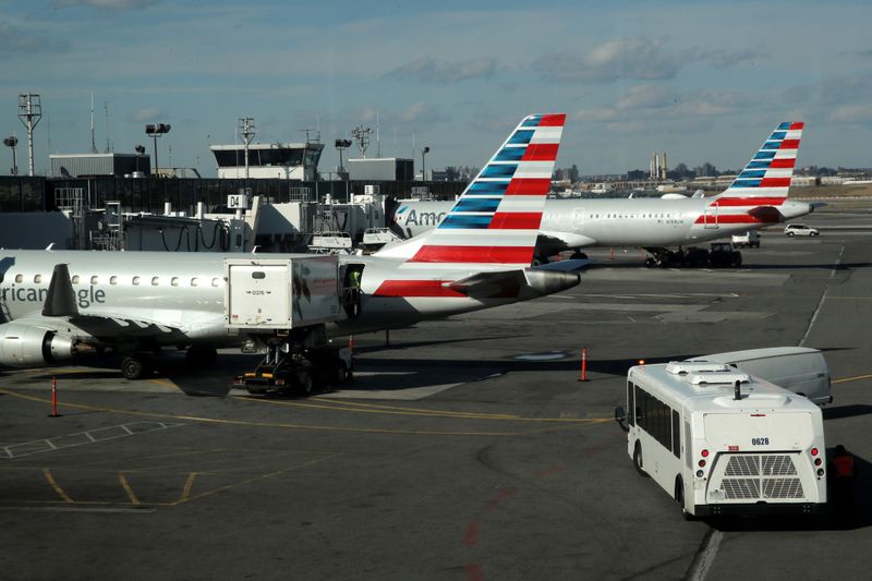 © Reuters. FILE PHOTO: Planes are seen parked at the terminal at LaGuardia Airport in New York City