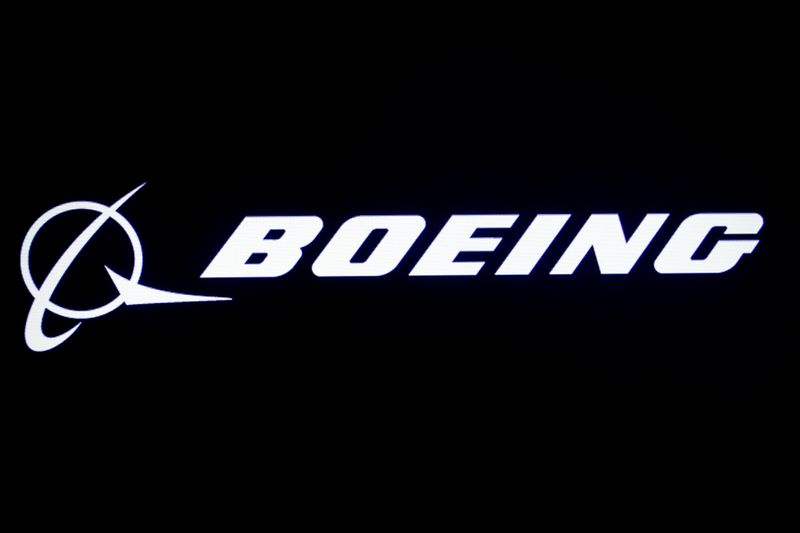 © Reuters. FILE PHOTO:  The Boeing logo is displayed on a screen, at the NYSE in New York