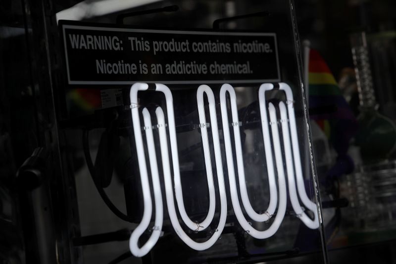 © Reuters. Signage for Juul vaping products is seen on a storefront in New York City