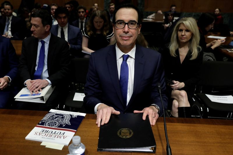 © Reuters. Treasury Secretary Steven Mnuchin testifies before a Senate Finance Committee