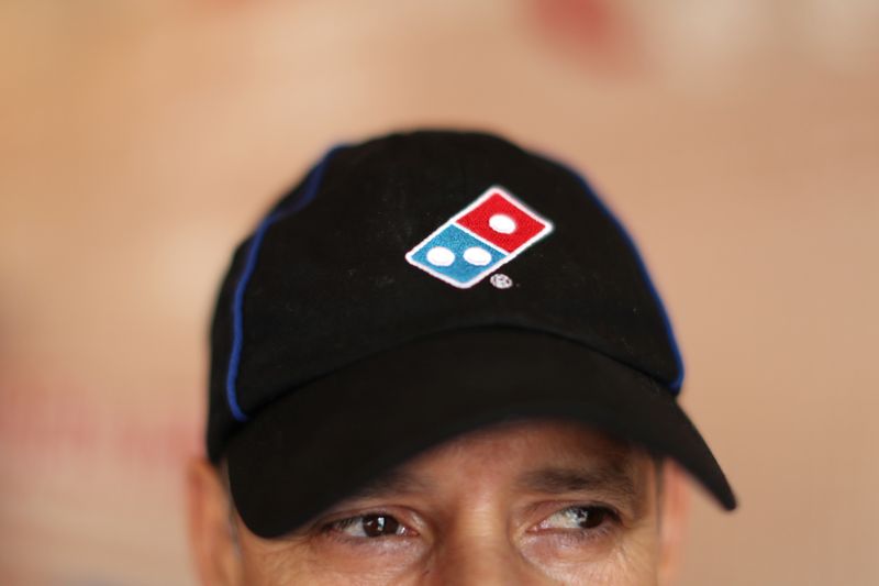 © Reuters. A Domino's Pizza employee works in a restaurant in Los Angeles