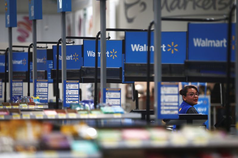 © Reuters. A cashier works inside a Walmart store in Mexico City