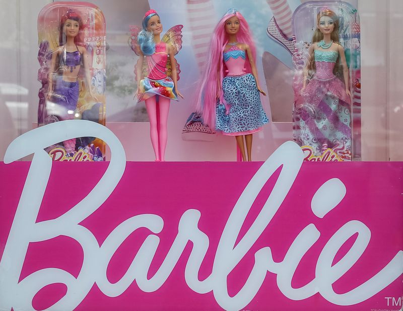 © Reuters. Barbie dolls are seen in a window of a toy store in Kiev
