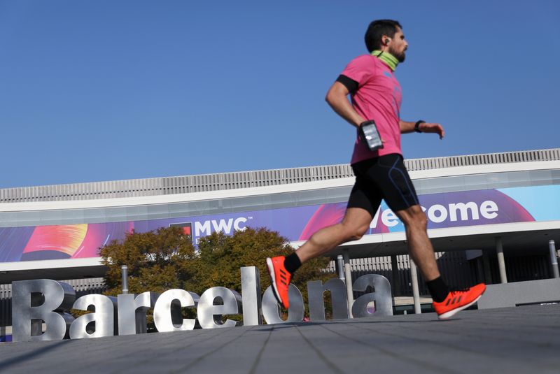 © Reuters. Man exercises at Fira de Barcelona after the Mobile World Congress (MWC) was cancelled in Barcelona