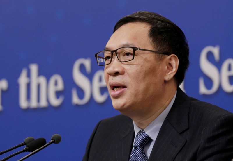 © Reuters. FILE PHOTO: Fan Yifei, vice governor of the PBOC, attends a news conference during ongoing session of the NPC in Beijing