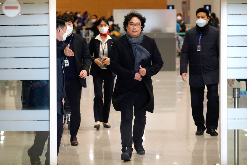 © Reuters. Director Bong Joon-ho arrives at Incheon International Airport in Incheon