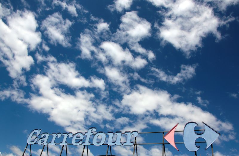 © Reuters. FILE PHOTO: A Carrefour logo is seen on a Carrefour Hypermarket store in Antibes