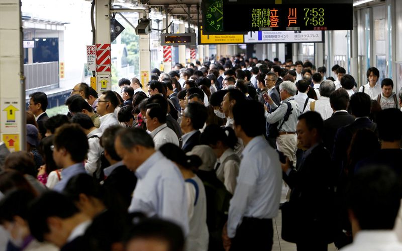 Tokyo commuters bound for Olympic crowd crush as Japan Inc rules out work from home