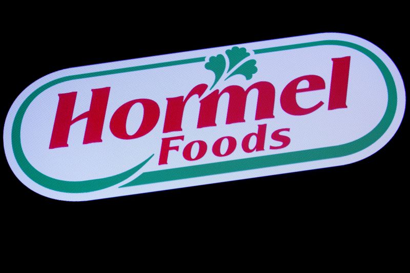 © Reuters. FILE PHOTO: The company logo for Hormel Foods is displayed on a screen on the floor at the NYSE in New York