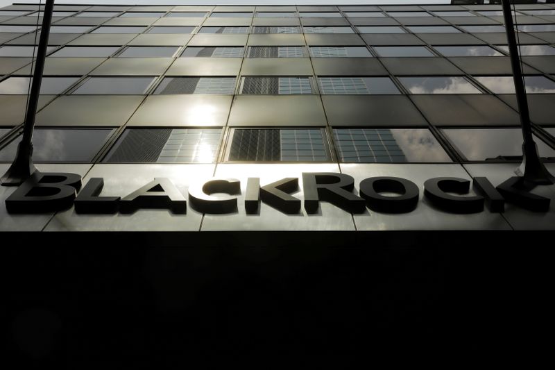 © Reuters. FILE PHOTO: A sign for BlackRock Inc hangs above their building in New York