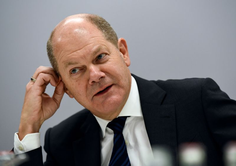 © Reuters. German Finance Minister Scholz speaks during an interview with Reuters in Berlin