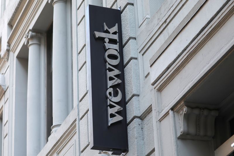 © Reuters. FILE PHOTO: A sign is seen above the entrance to the WeWork corporate headquarters in Manhattan, New York