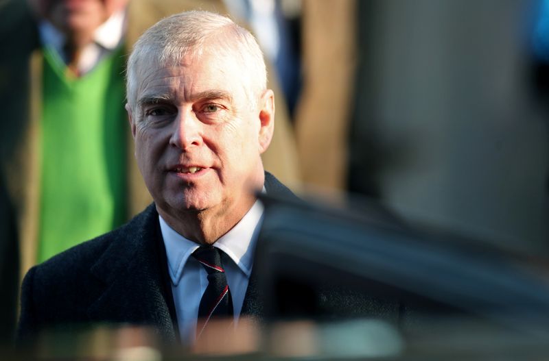 Tell Prince Andrew to call FBI says message on U.S-style bus near palace