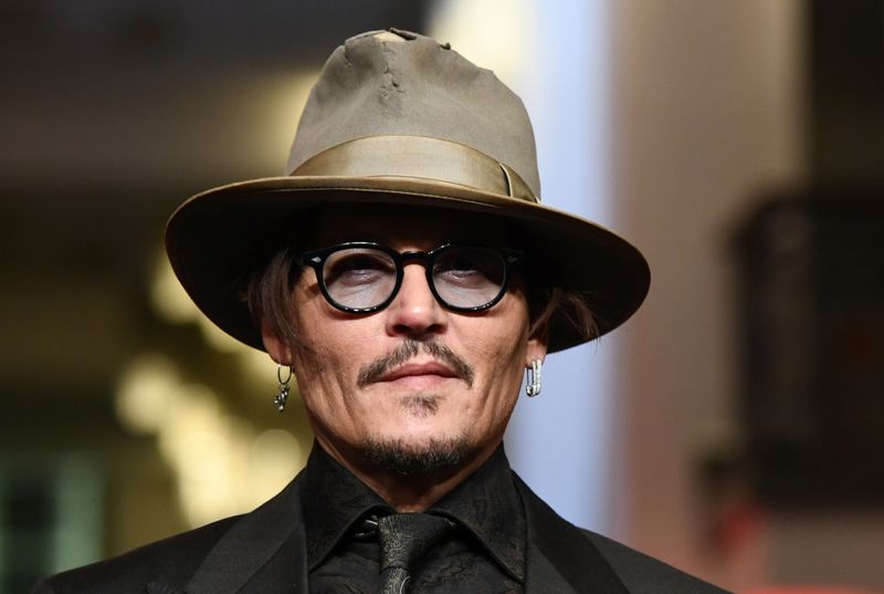 Finding a purpose: Johnny Depp plays a troubled genius in &quot;Minamata&quot;