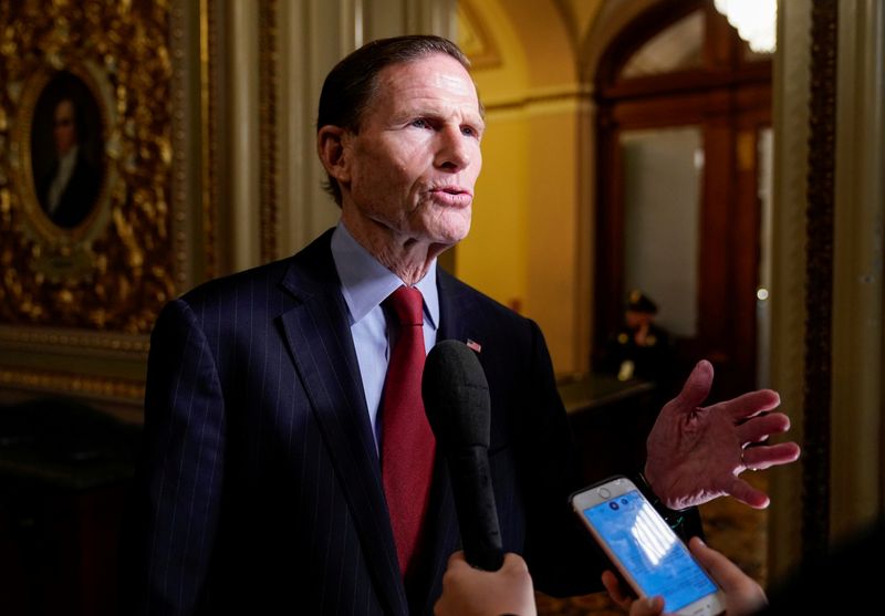 © Reuters. FILE PHOTO: Senator Blumenthal speaks to reporters during a break as the Trump impeachment trial continues in Washington.