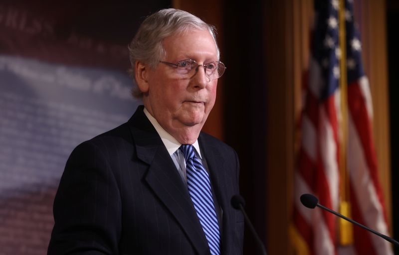 © Reuters. FILE PHOTO:  Senate Majority Leader McConnell speaks to reporters after the Senate voted to acquit U.S. President Trump impeachment trial on Capitol Hill in Washington