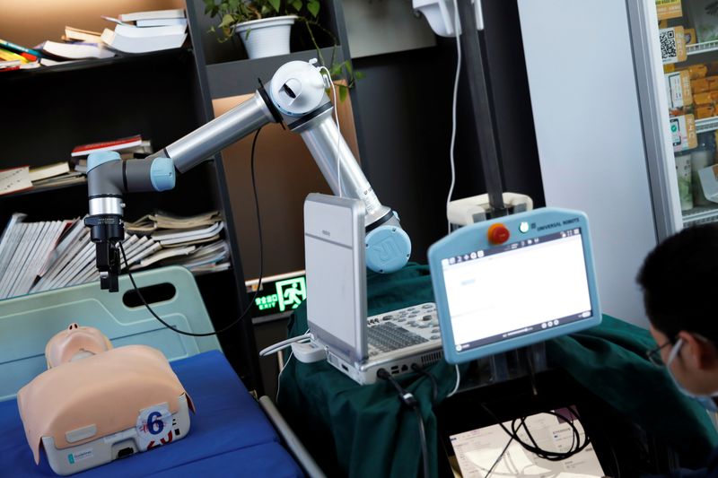 Robotic arm designed in China could help save lives on medical frontline