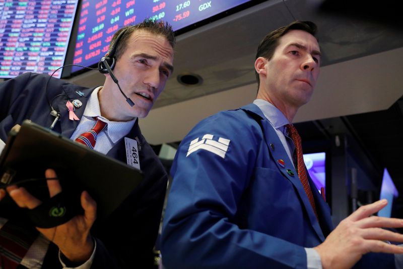 Coronavirus boosts Wall Street trading, easing pain from lower rates
