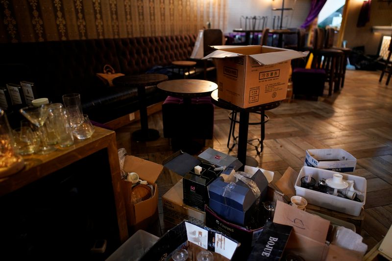 &copy; Reuters. Boxes of cooking equipment and tools are seen inside Barules, a cocktail bar that has been shut for good following the novel coronavirus outbreak, in Shanghai