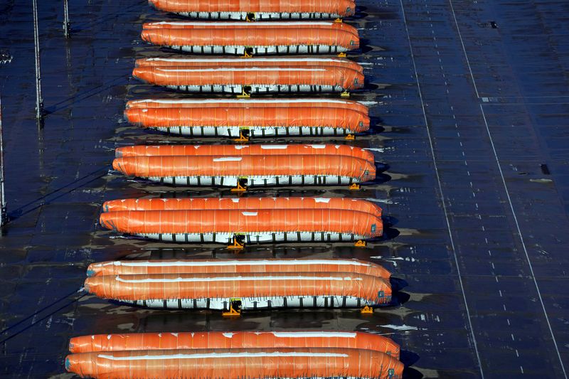 © Reuters. FILE PHOTO: Airplane fuselages bound for Boeing's 737 Max production facility sit in storage at their top supplier, Spirit AeroSystems Holdings Inc, in Wichita