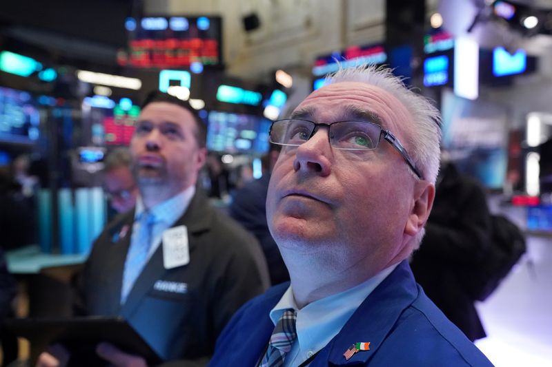 Wall Street clobbered as crude plummets, virus crisis deepens