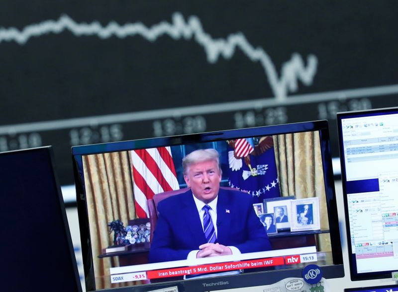 © Reuters. A television broadcast showing U.S. President Donald Trump is pictured during a trading session at Frankfurt's stock exchange in Frankfurt