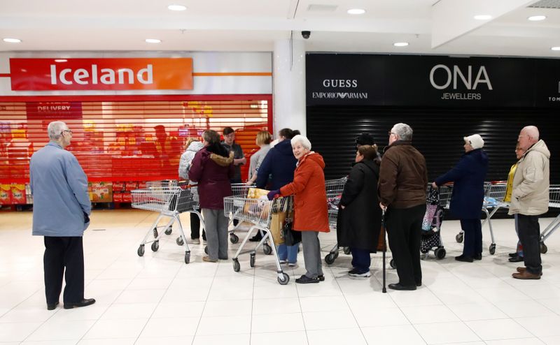 © Reuters. An Iceland store in the Kennedy Centre opening one hour early to allow elderly shoppers to buy food