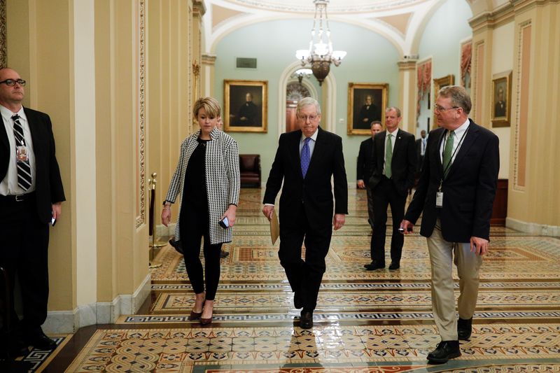 © Reuters. Senate Majority Leader McConnell walks into the Senate Chamber, as Mayor Muriel Bowser declared a State of Emergency due to the coronavirus disease (COVID-19), on Capitol Hill in Washington