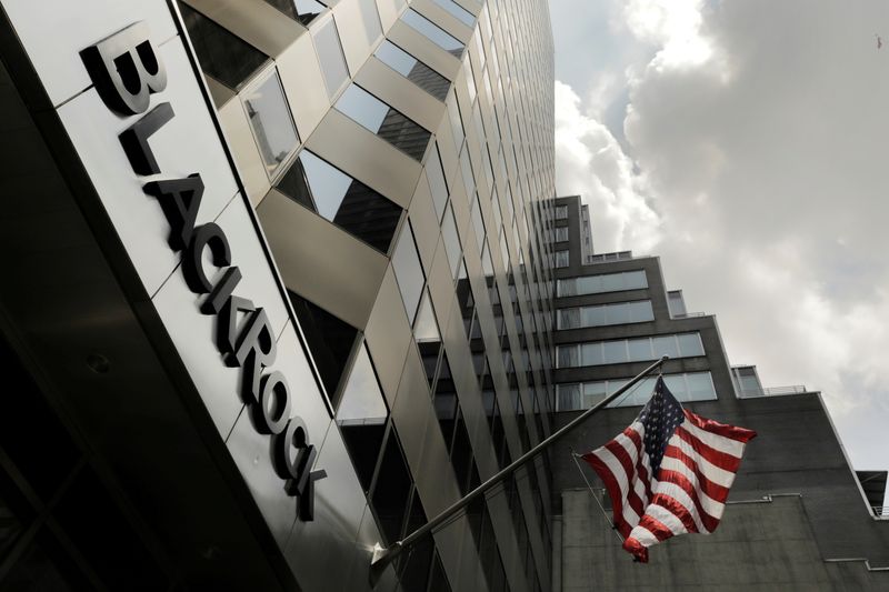 © Reuters. FILE PHOTO: A sign for BlackRock Inc hangs above its building in New York