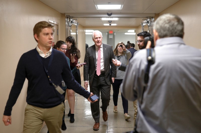 © Reuters. Senator Cornyn speaks to news reporters ahead of a series of votes on response to the coronavirus disease (COVID-19) outbreak, on Capitol Hill in Washington