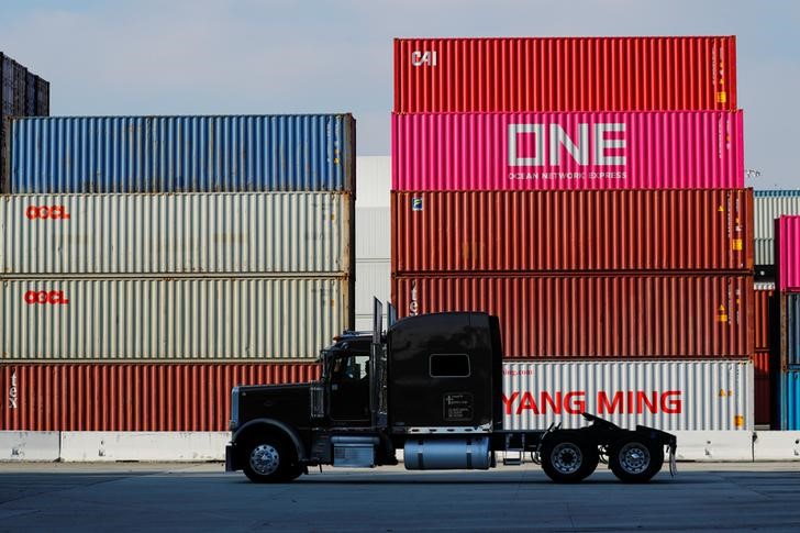 &copy; Reuters. A trucker arrives to haul shipping containers at Yusen Terminals on Terminal Island at the Port of Los Angeles