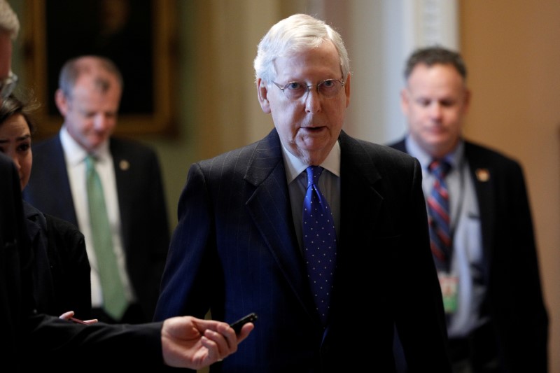 &copy; Reuters. Senate Majority Leader McConnell speaks to members of the news media while walking into his office, as Mayor Muriel Bowser declared a State of Emergency due to the coronavirus disease (COVID-19), on Capitol Hill in Washington