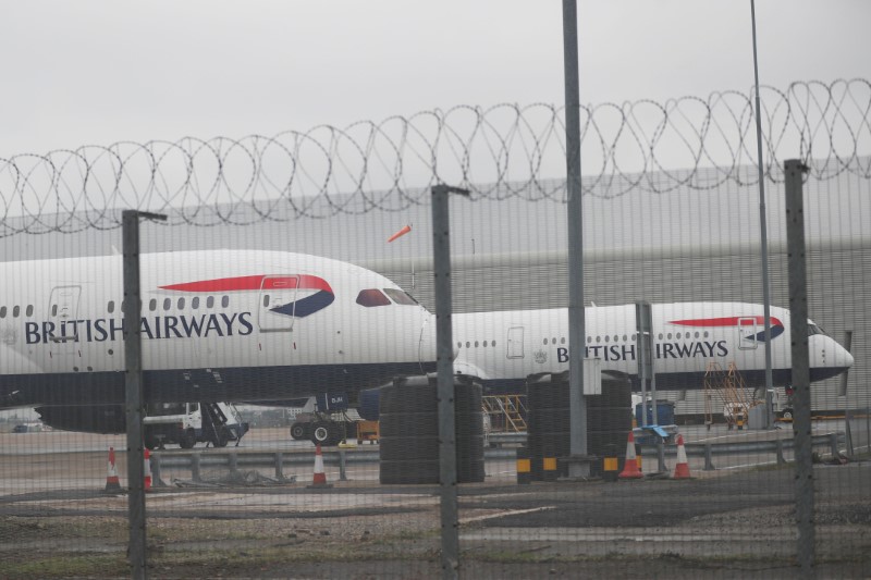 © Reuters. Parked British Airways planes are seen at Heathrow Airport in London