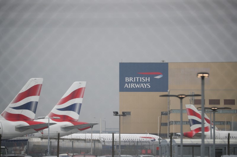 © Reuters. Parked British Airways planes are seen at Heathrow Airport in London