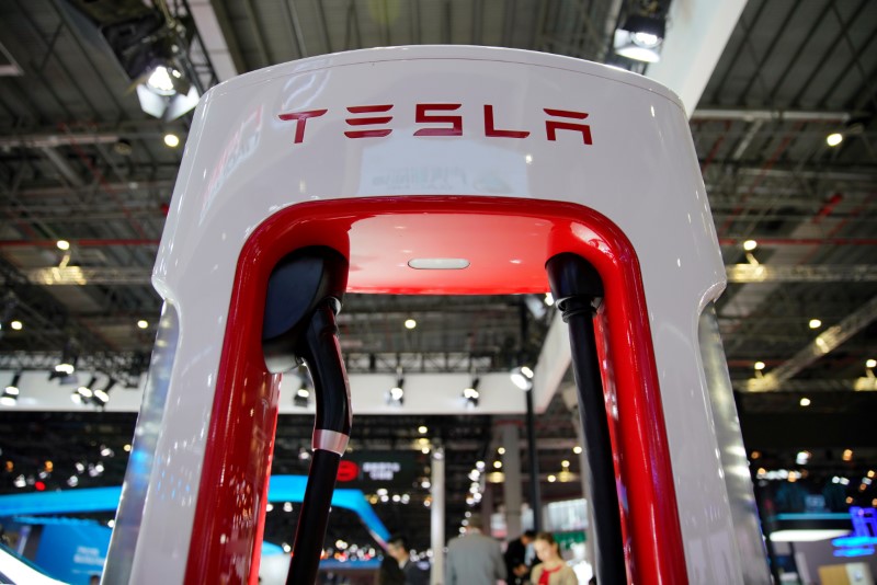 © Reuters. Tesla charging station is pictured during the media day for the Shanghai auto show in Shanghai