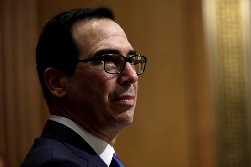 © Reuters. FILE PHOTO: U.S. Treasury Secretary Steven Mnuchin testifies before a Senate Finance Committee