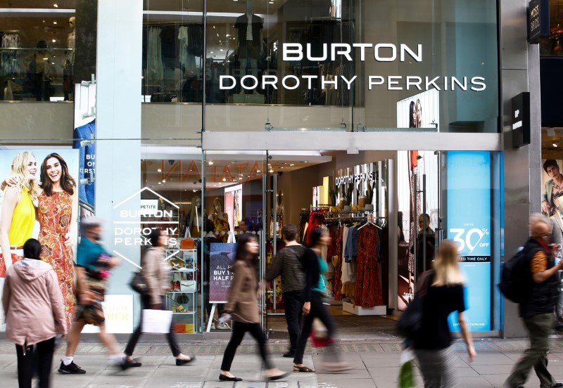 © Reuters. People walk past a Burton and Dorothy Perkins store, owned by Arcadia Group, in central London