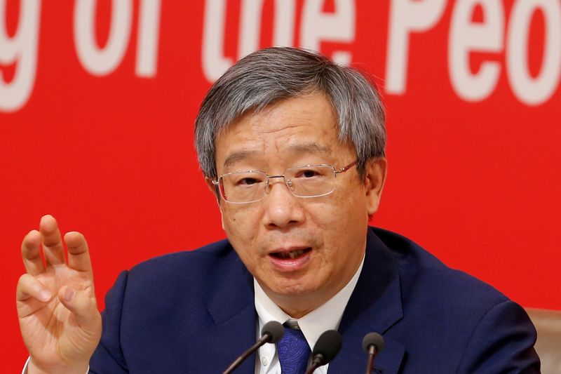 &copy; Reuters. FILE PHOTO: Governor of People&apos;s Bank of China (PBOC) Yi Gang attends a news conference on China&apos;s economic development ahead of the 70th anniversary of its founding, in Beijing