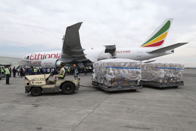 &copy; Reuters. Ethiopian Airlines worker transports a consignment of medical donation from Chinese billionaire Jack Ma and Alibaba Foundation to Africa in Addis Ababa