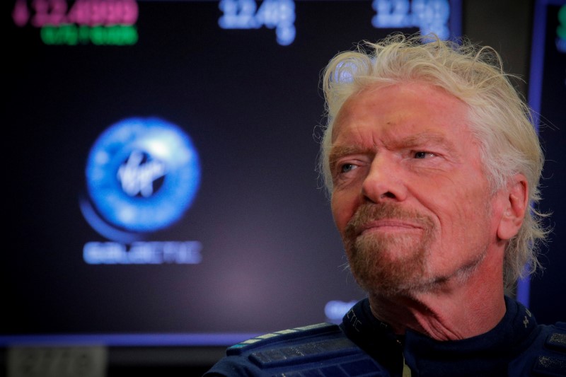 &copy; Reuters. FILE PHOTO: Sir Richard Branson stands on the floor of the New York Stock Exchange ahead of the start of trading in Virgin Galactic in New York