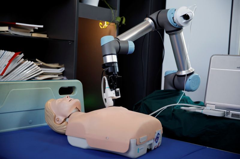 &copy; Reuters. A robot designed to help medical workers treat coronavirus patients remotely is pictured at the aerospace engineering school of Tsinghua University in Beijing