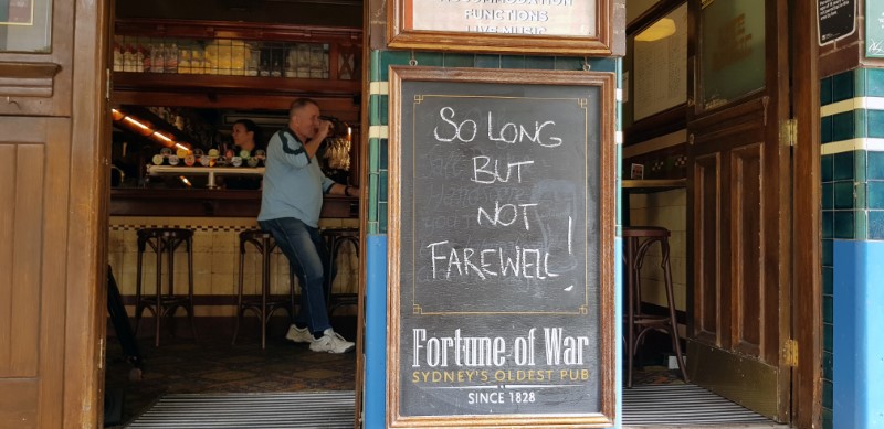 &copy; Reuters. Sign in front of Fortune of War pub reads &apos;so long but not farewell&apos; before it shut down due to coronavirus concerns, in Sydney