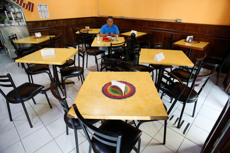 &copy; Reuters. A man is pictured inside a restaurant as the coronavirus disease (COVID-19) outbreak continues in Mexico City